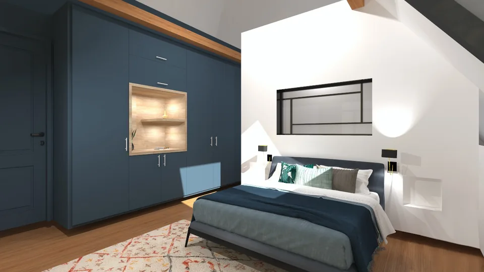 La chambre à été travaillée avec différentes teintes de bleu et un travail sur la verrière séparant la chambre de la salle de bain.